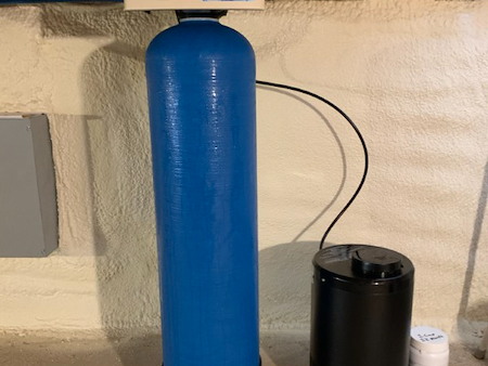 What Causes Orange Stains in Well Water and Which Iron Filter Fixes It?
